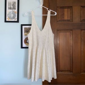 silence + noise white dress with gold shimmer